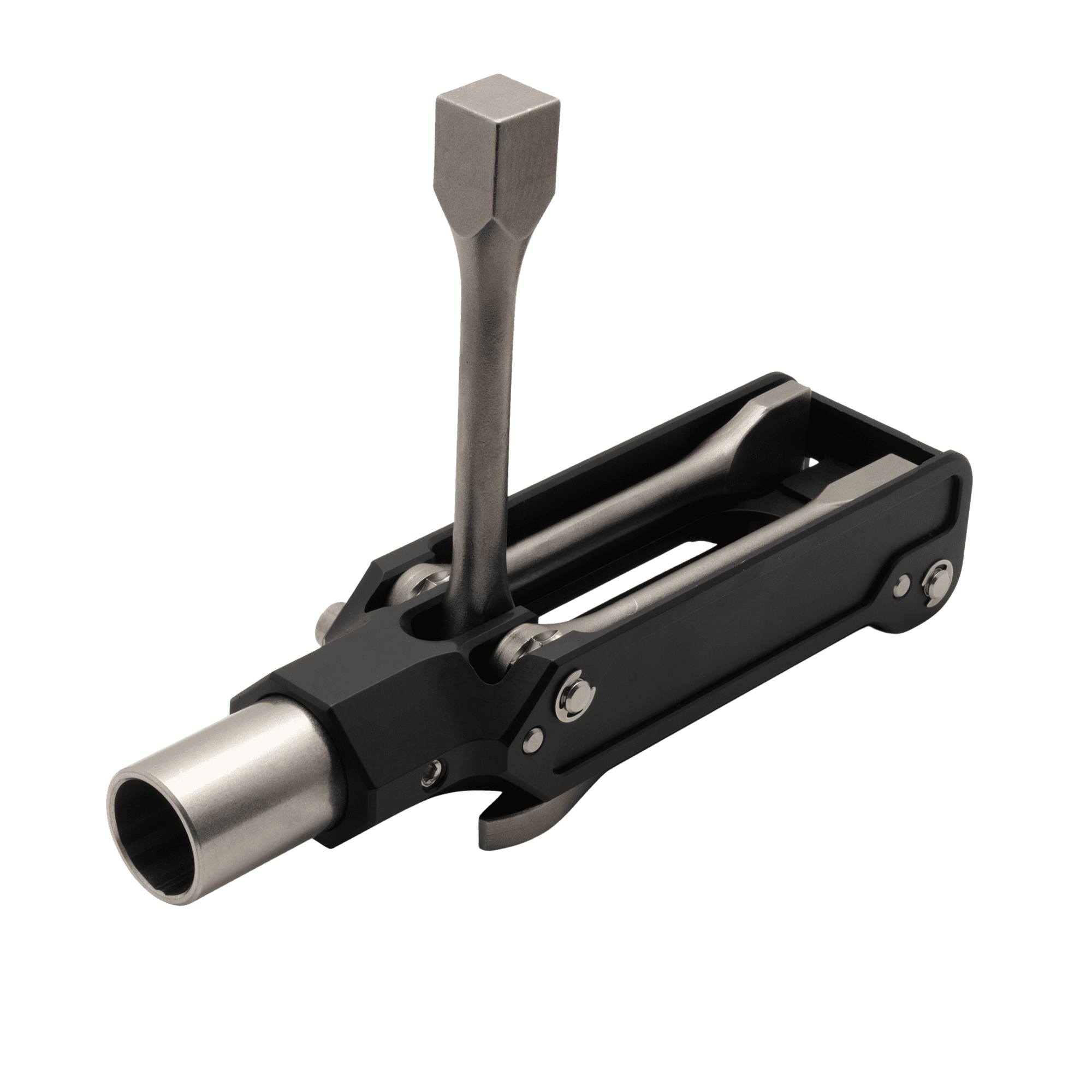 A black and silver tool is sitting on top of a green background.